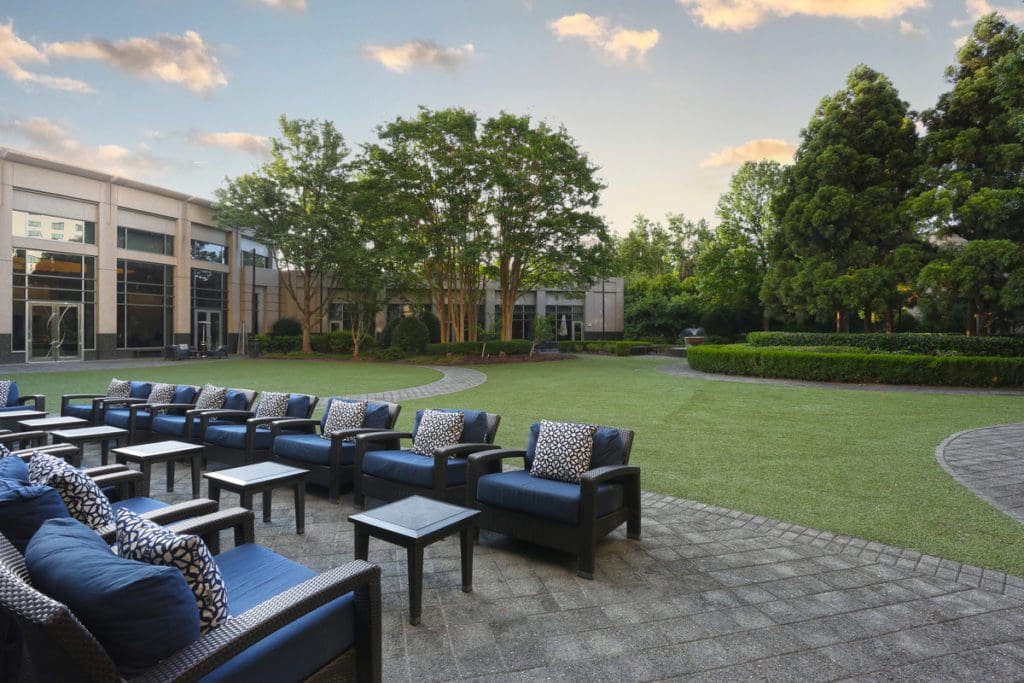 The outdoor lawn and seating area at InterContinental Buckhead Atlanta.