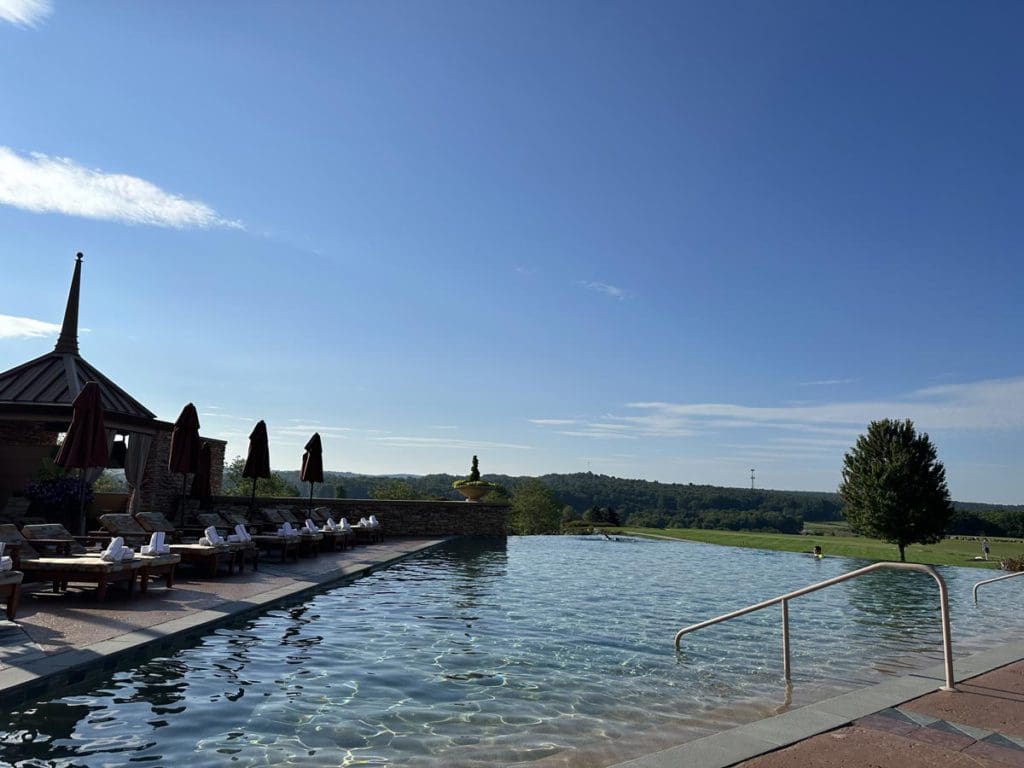 The outdoor pool at Nemacolin, a family resort in Pennsylvania your family will love.