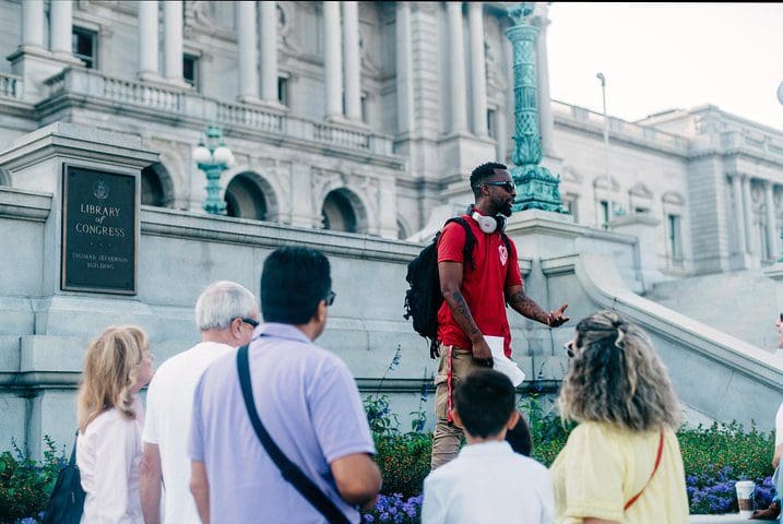 A tour guide leads the Washington DC in One Day: Guided Sightseeing Tour.