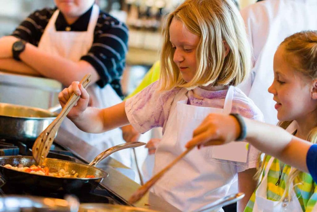 School age children learn to make pasta.