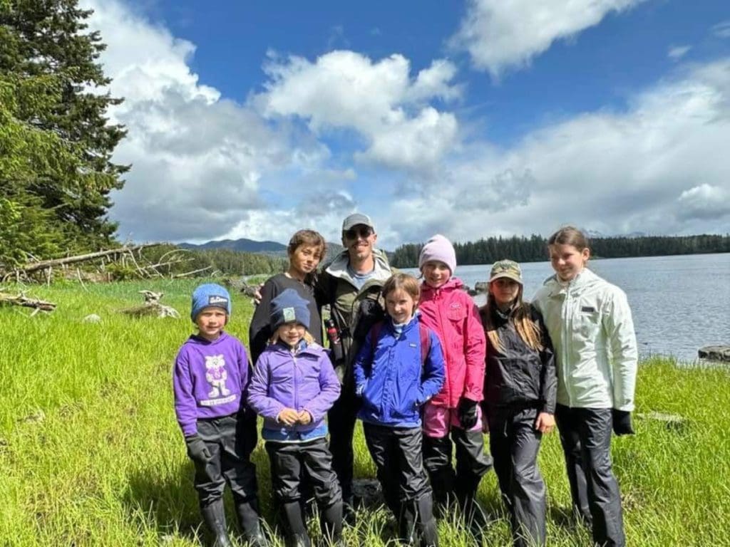 A family enjoys a sunny day of exploring southeast Alaska.