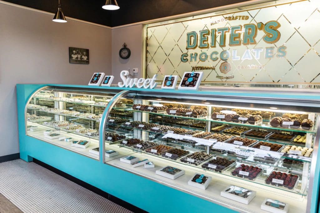 The chocolate case filled with sweet treats at Deiter’s Chocolates, one of the best dessert spots in Denver with kids.