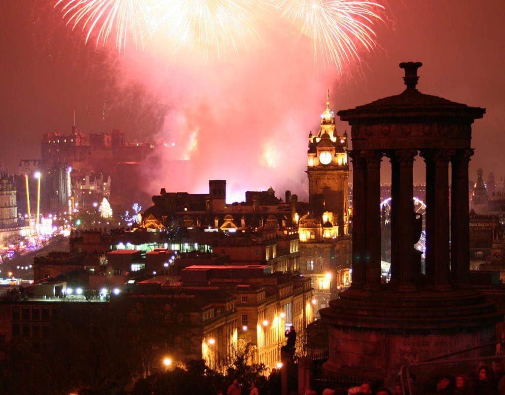 Fireworks over Edinburgh, one of the best destinations for New Year's with kids.