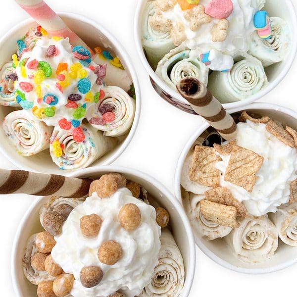 An overhead of four ice cream dishes from Milkroll Creamery.