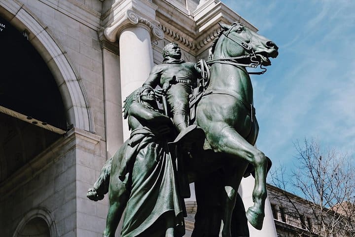A large statue outside the Museum of Natural History in NYC, as seen on the Museum of Natural History - Exclusive Guided Tour.
