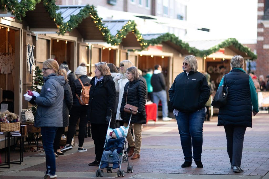 People explore and shop at the Kerstmarkt Christmas Market in Pella.