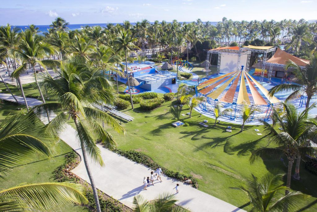 An aerial view of the property surrounded by Palm Trees at Club Med Punta Cana, one of the best resorts in the Dominican Republic for families!