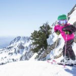 A child on ski sat the Snowbasin Ski Resort in Utah