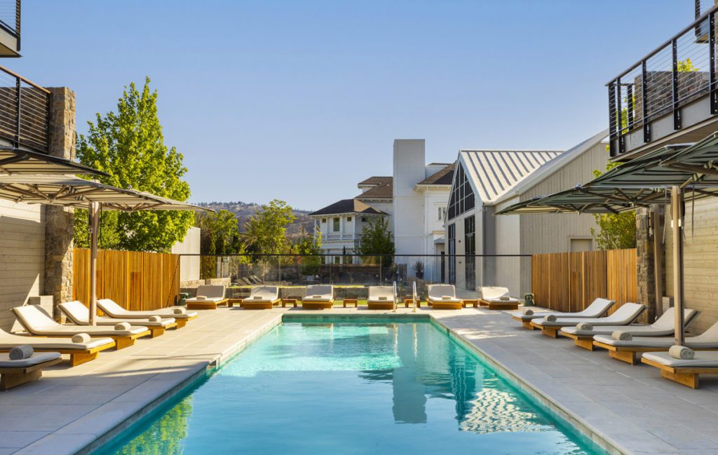 The outdoor pool at Alila Napa Valley, one of the best hotels In Napa Valley for a romantic getaway or girls' weekend.