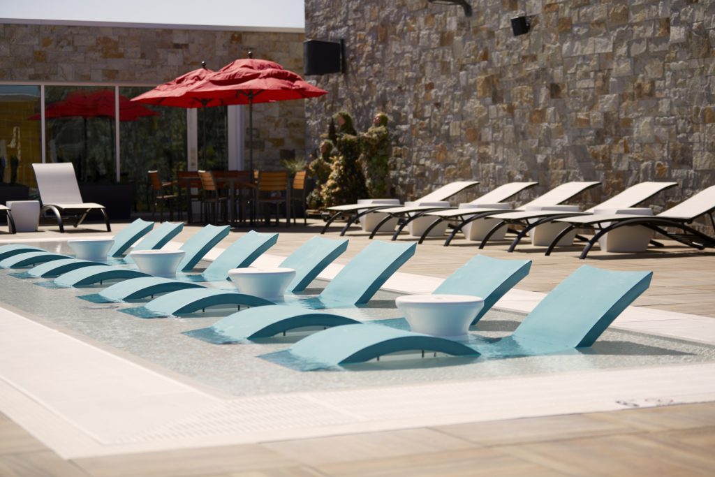 Sun loungers at the outdoor pool at Archer Napa Valley