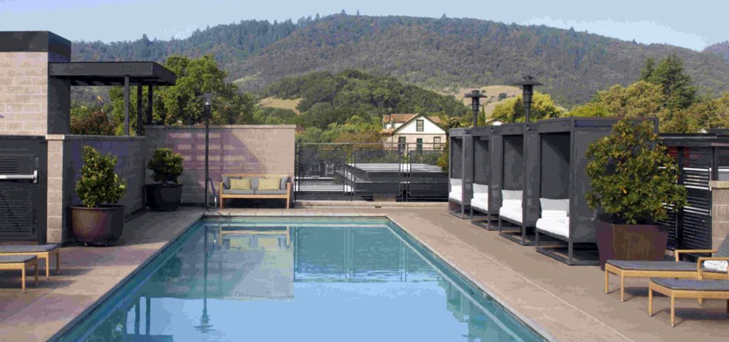 The outdoor pool at Bardessono Hotel and Spa, one of the best hotels In Napa Valley for a romantic getaway or girls' weekend.