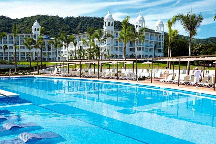 The outdoor pool at Hotel Riu Palace, one of the best all-inclusive resorts in Costa Rica for families.