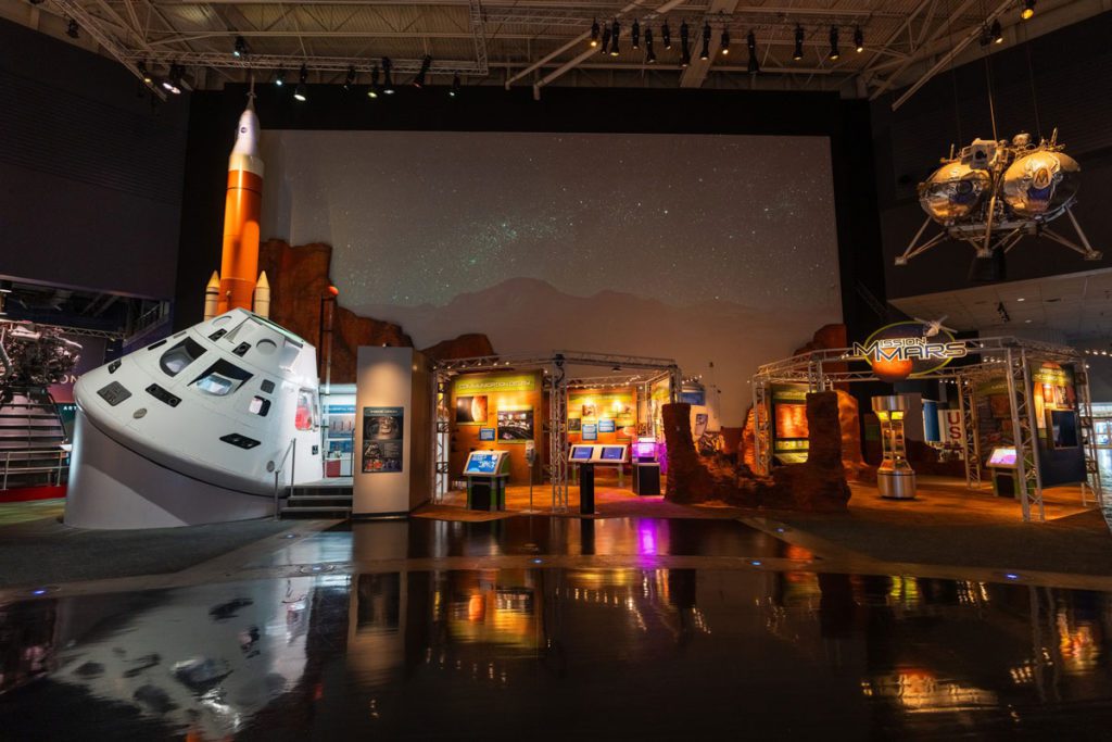 Spaceships and other exhibits inside The Space Center Houston, one of the best places to visit in Texas with kids.  