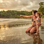 A mother and her child on the beach in Costa Rica