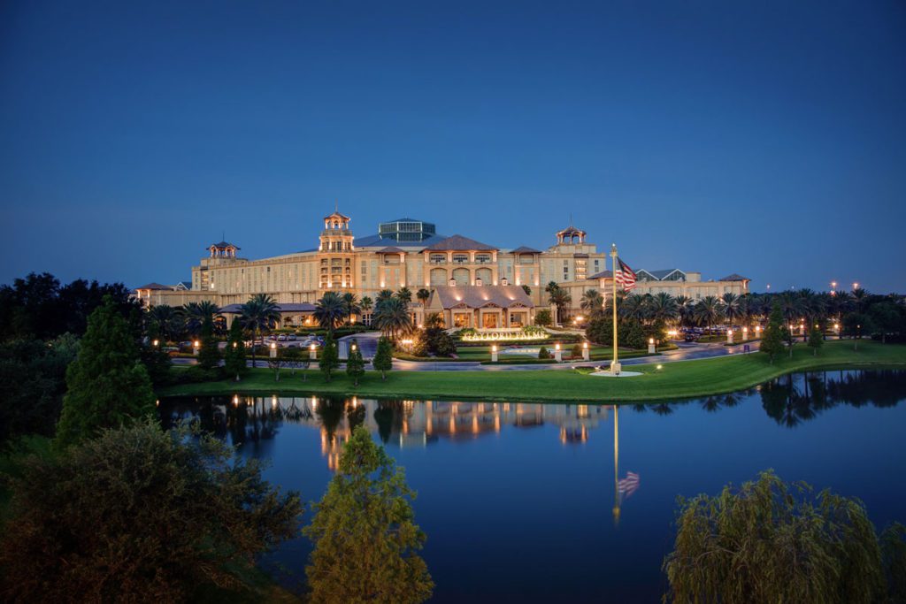 A nighttime view of the Gaylord Palms Resort and Convention Center, one of the best Marriott hotels in Florida for families. 