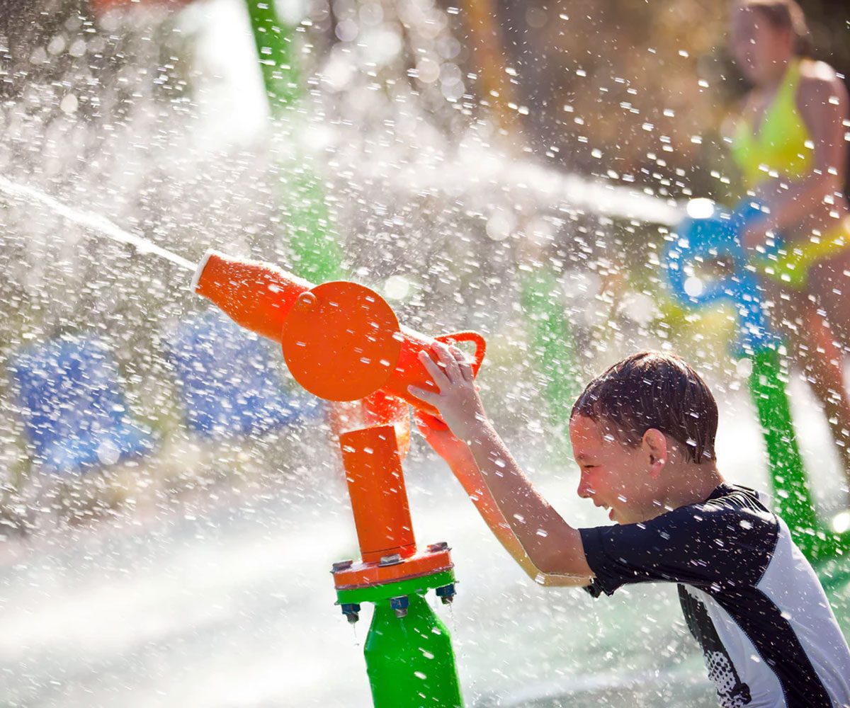 A child playing with a water gun at the Renaissance Orlando at SeaWorld